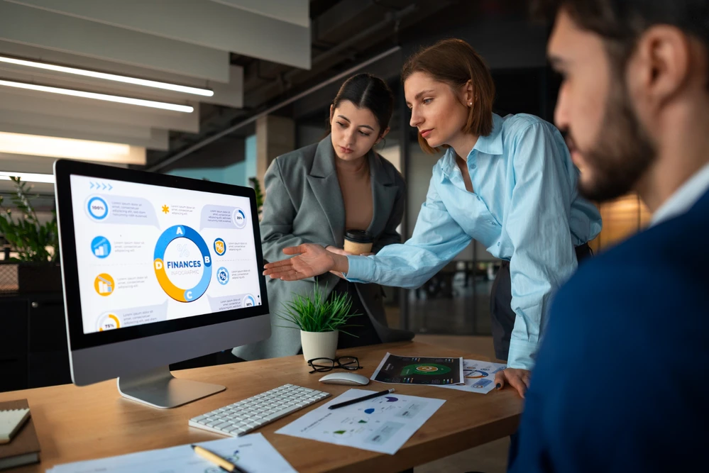 Team of developers working on CRM dashboard interface – best CRM software development company concept.