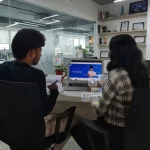 Best CRM software for educational institutions in India 2026 displayed on laptop during team discussion